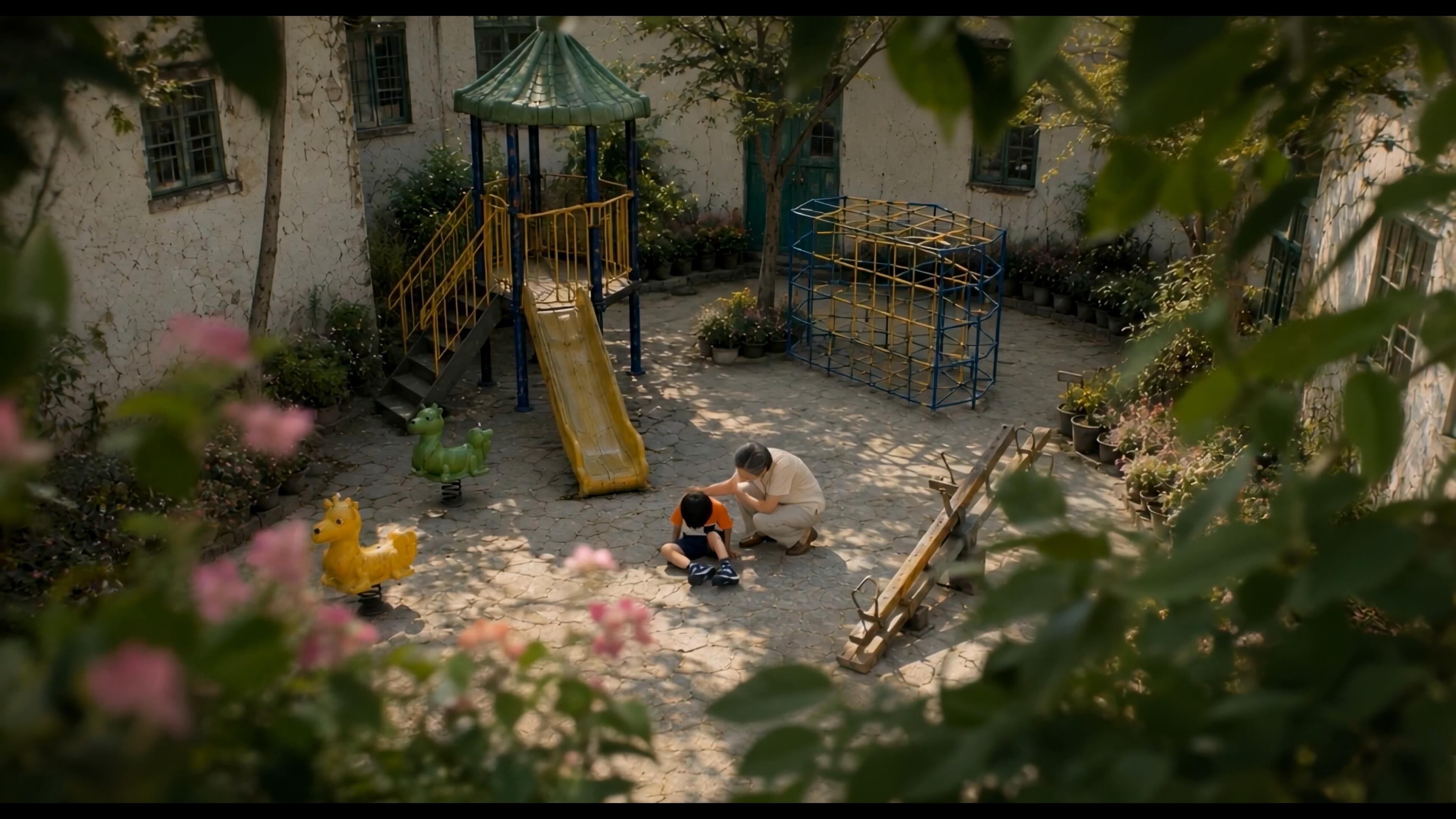 Establishing view of the courtyard where the child-injury sequence takes place.
